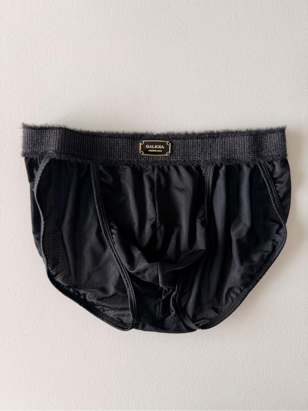 Men's Black Saligia briefs with metal tag